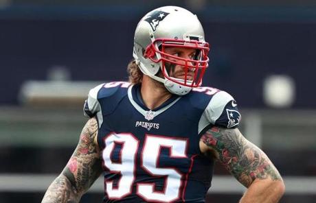 09/18/16: Foxborough, MA: Patriots defensive lineman Chris Long is pictured on the field during the game vs. the Dolphins. (Globe Staff Photo/Jim Davis) section: sports topic: Patriots-Dolphins
